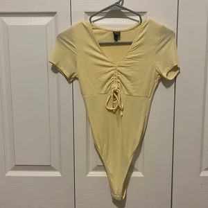 Yellow body suit
